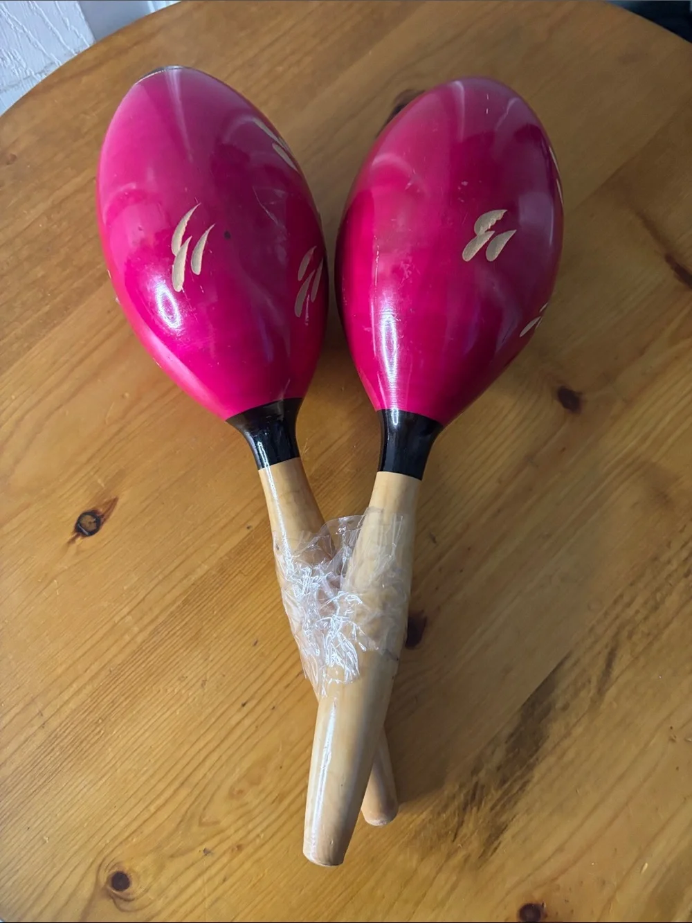 Pair of Magenta Wooden Maracas with Gold Accents